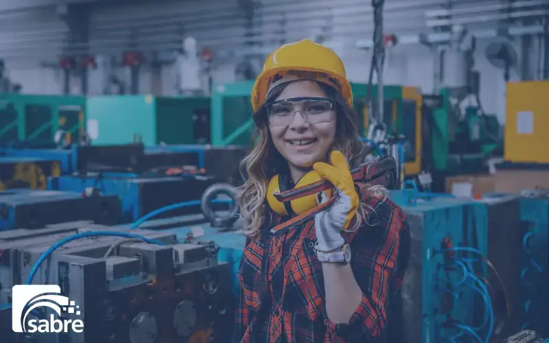 manufacturing worker by a machine