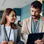 two workers discussing an issue